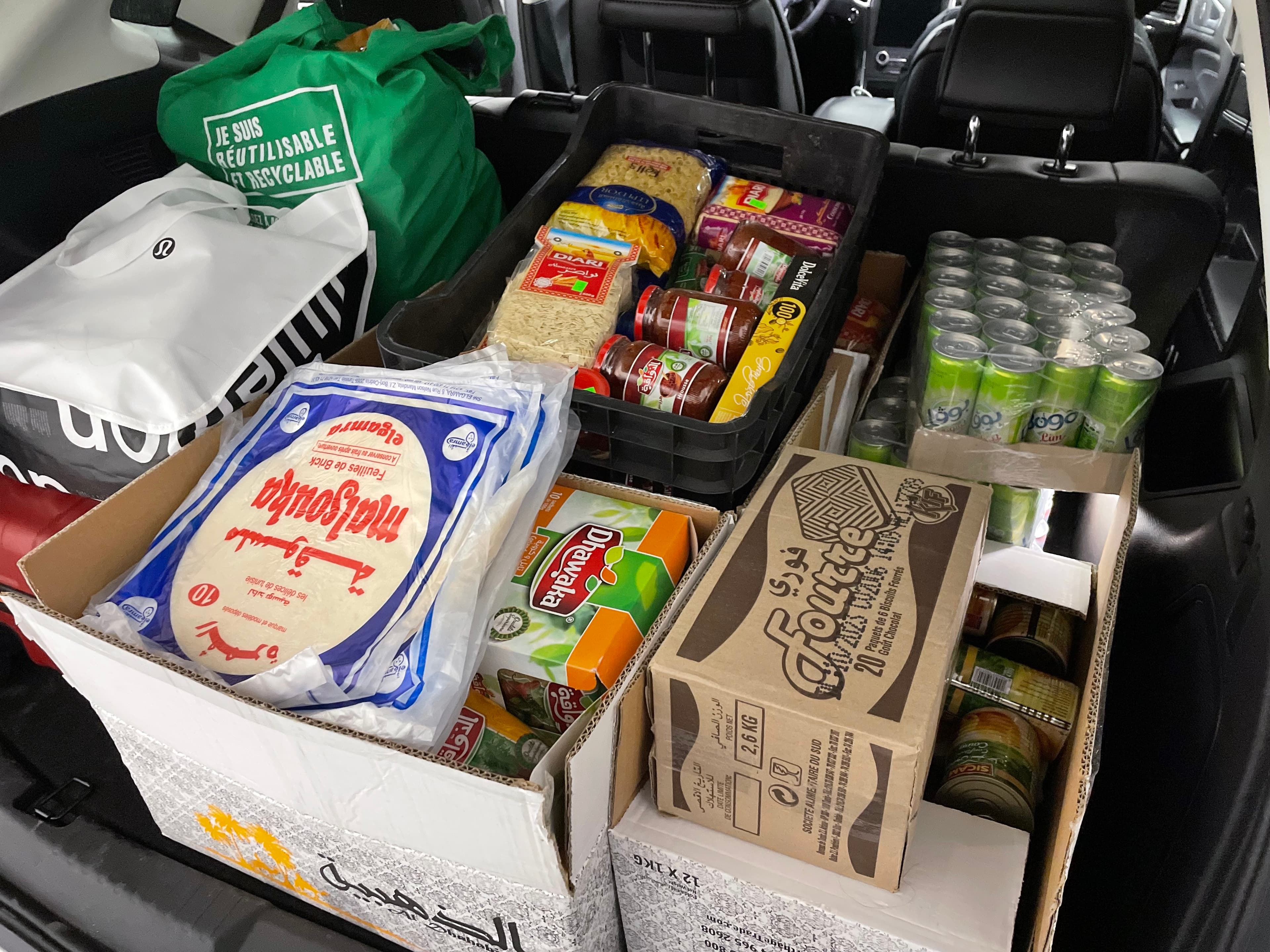 Sourcing run — trunk full of Tunisian products from Montreal